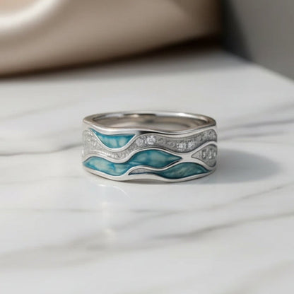 Elegant ring i turkos och silver med vågmönster