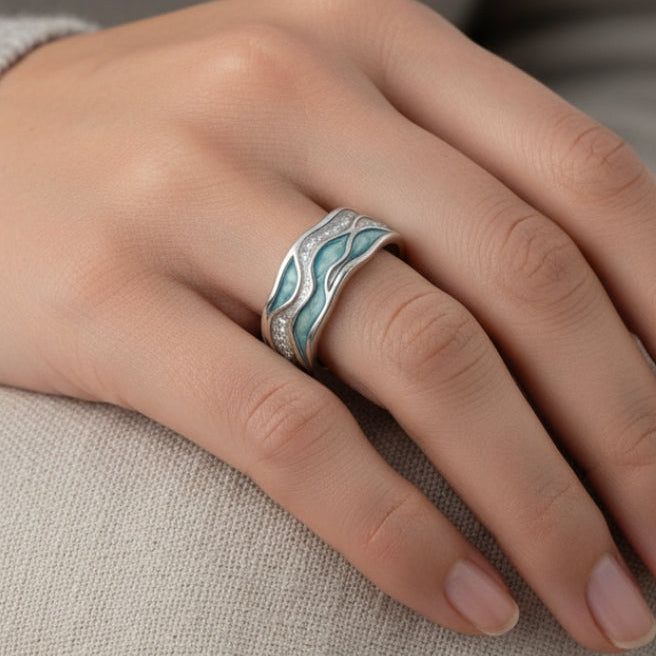Elegant ring i turkos och silver med vågmönster