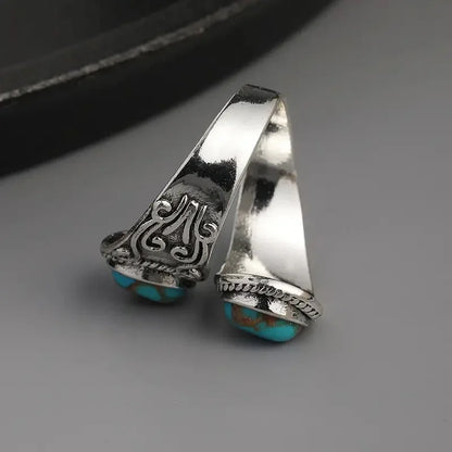 Elegant vintage-ring med turkos och korsmönster