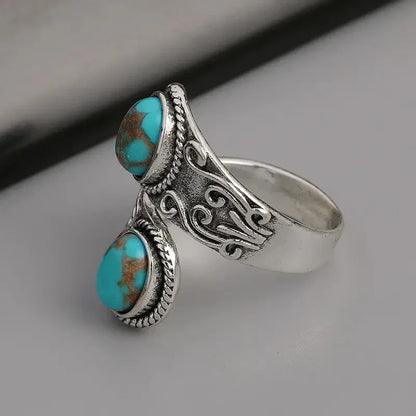 Elegant vintage-ring med turkos och korsmönster