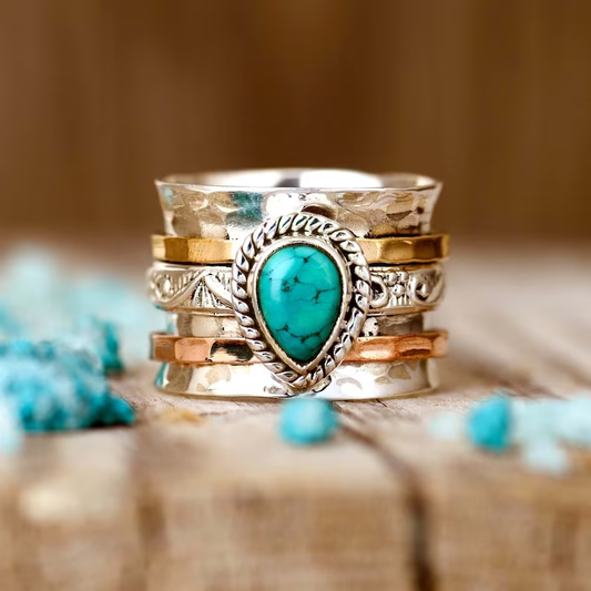 Antik ring i guld och silver med turkosinläggningar